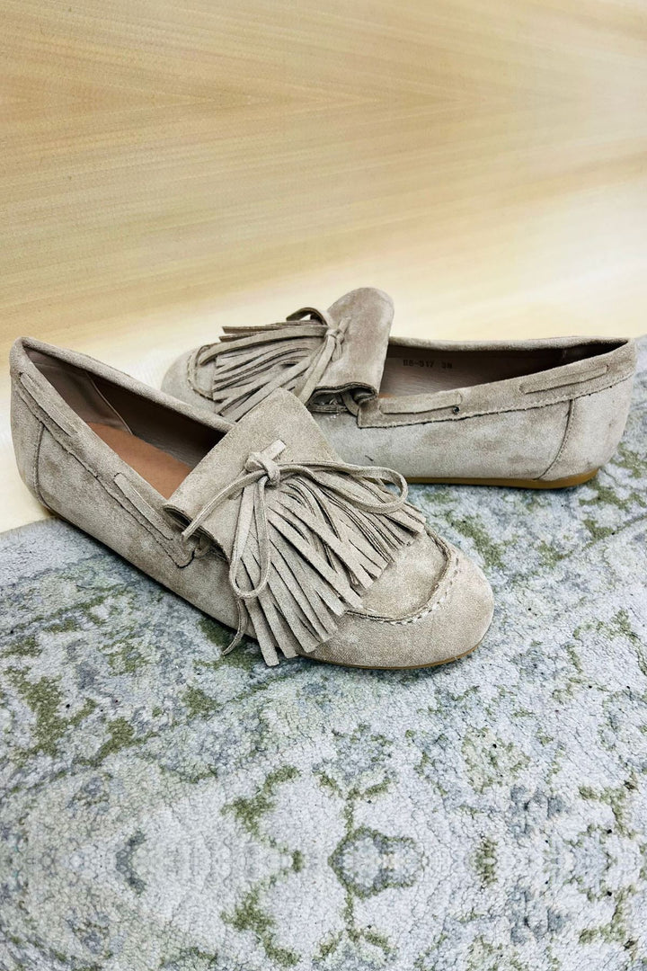 Suede fringe detail slip on flat shoes
